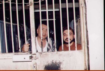 Kamal Labwani in the prison uniform.